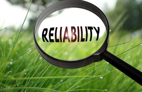 Reliability "Reliability" word in magnifying glass